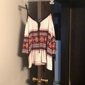 Shirt with cut in sleeves